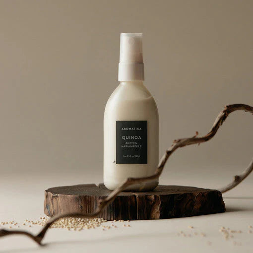 Izsmidzināms serums bojātiem matiem ar peptīdiem Aromatica Quinoa Protein Hair Ampoule